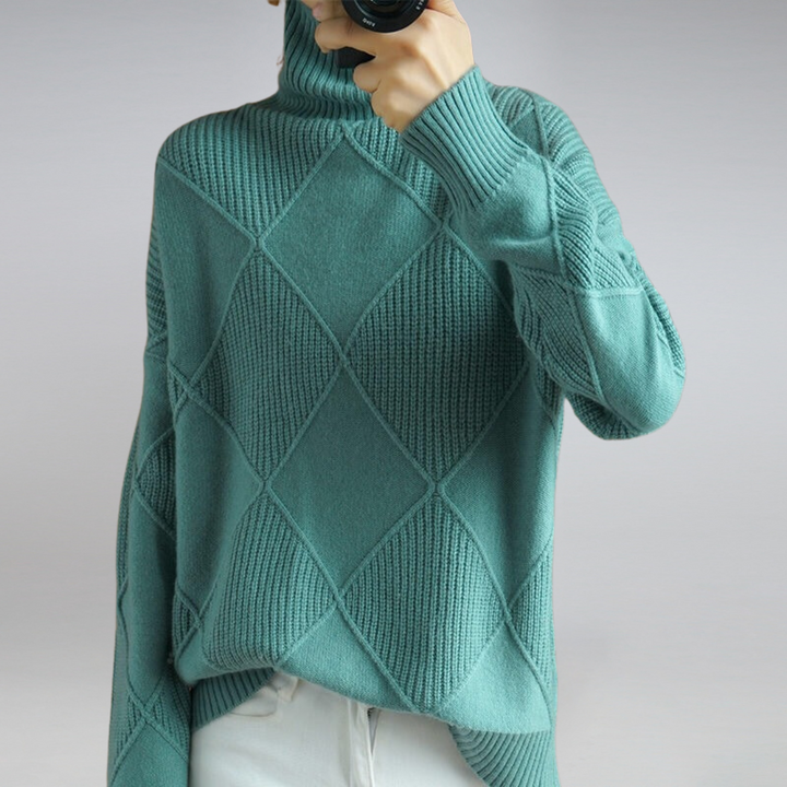 Back view of women's casual turtleneck knit sweater showing solid color drape.