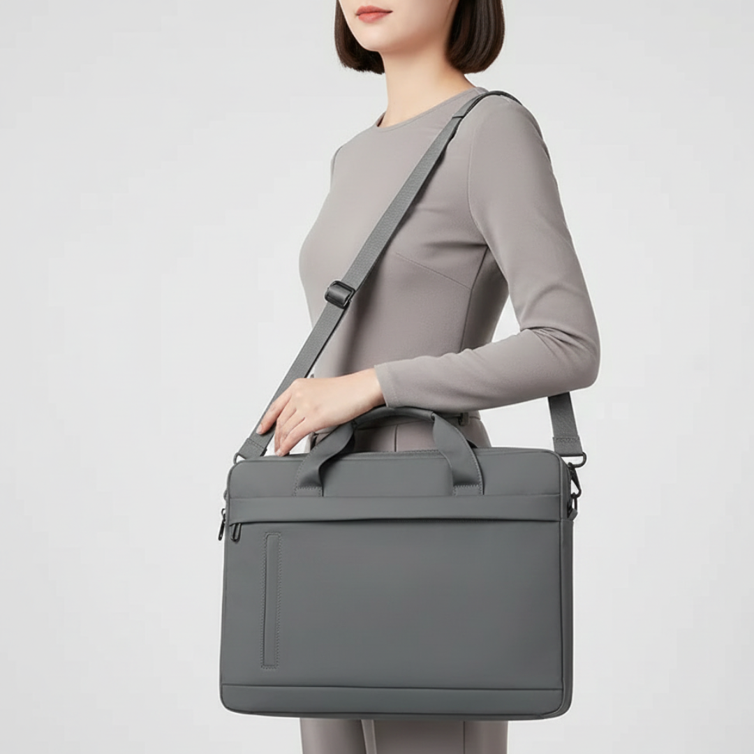 Professional unisex laptop carry bag in black, ideal for work and business travel.