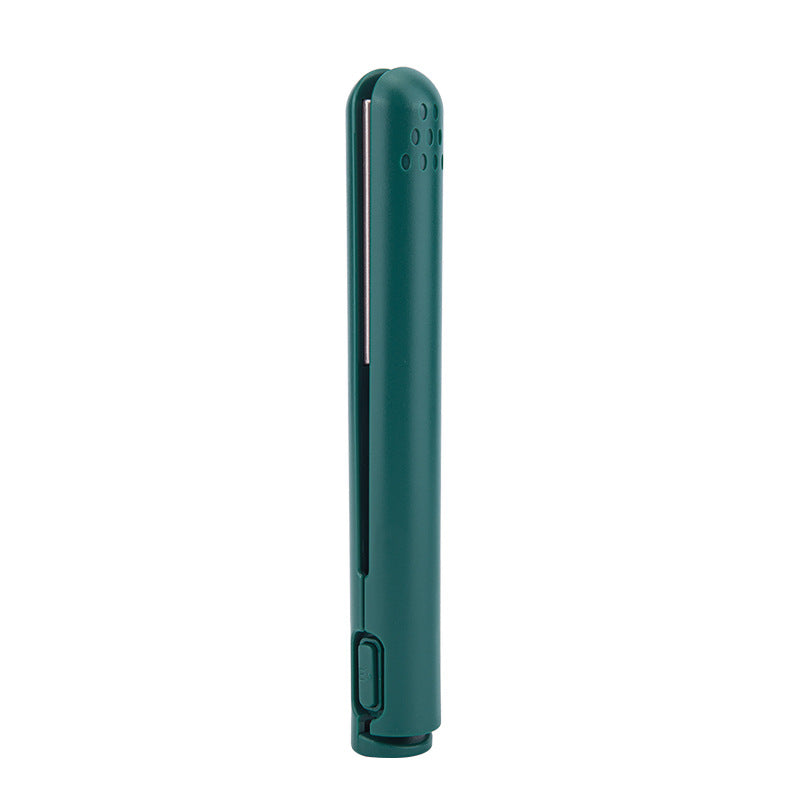 Side profile of the mini hair iron highlighting sleek body and vibrant finish