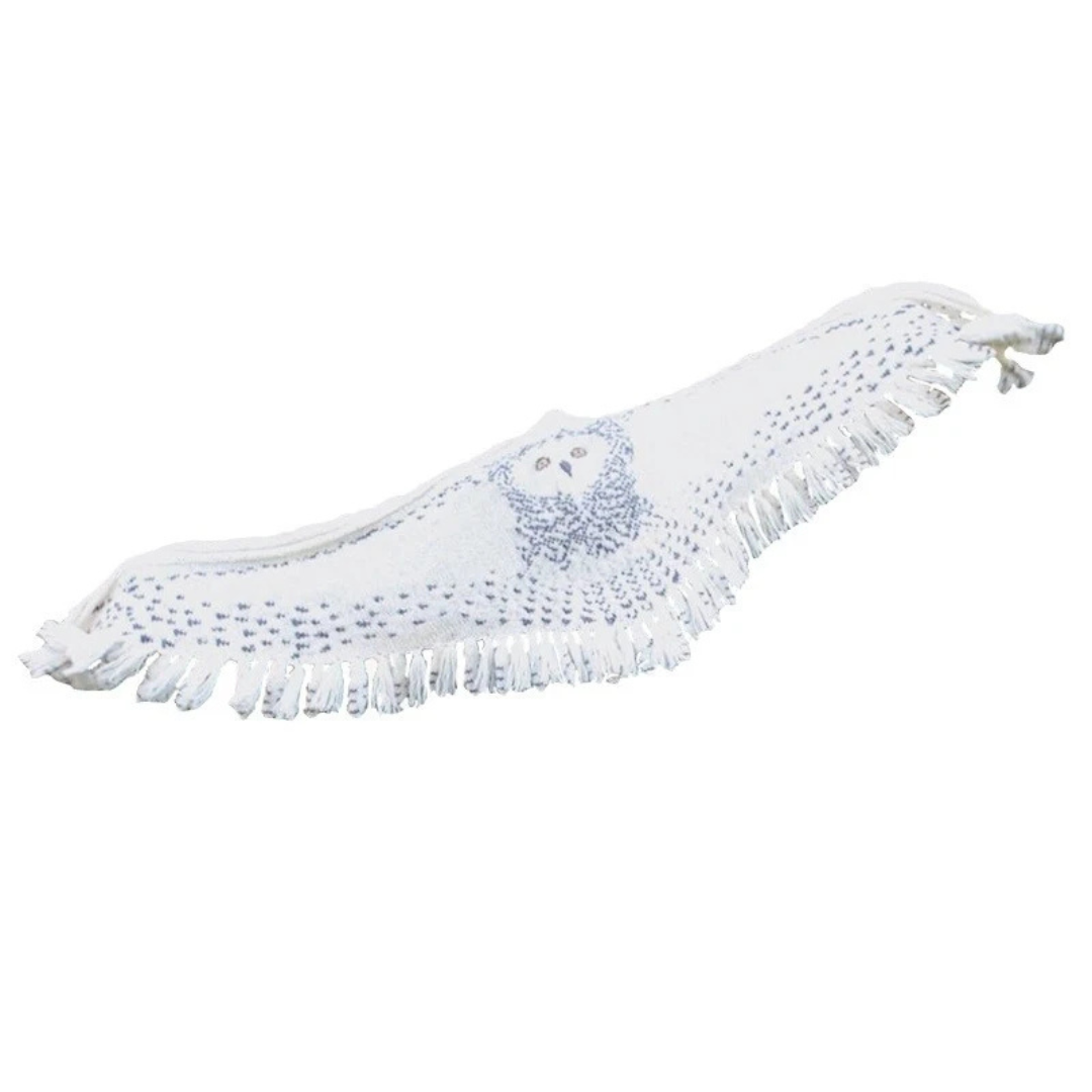 Detailed view of the owl knitted shawl spread out showcasing the wing design and fringe