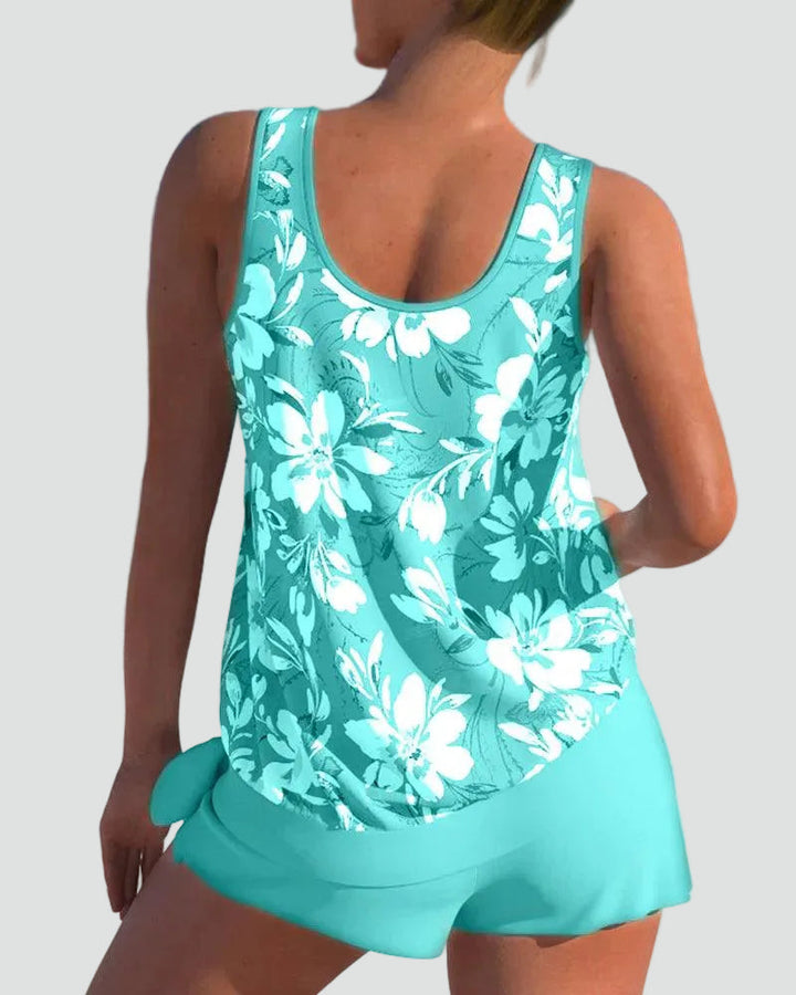 Back view of women's floral print tankini set showing supportive straps and modest coverage