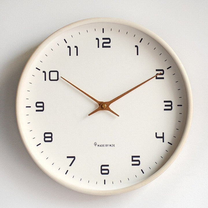 Silent nordic wooden wall clock showcasing simple modern home styling