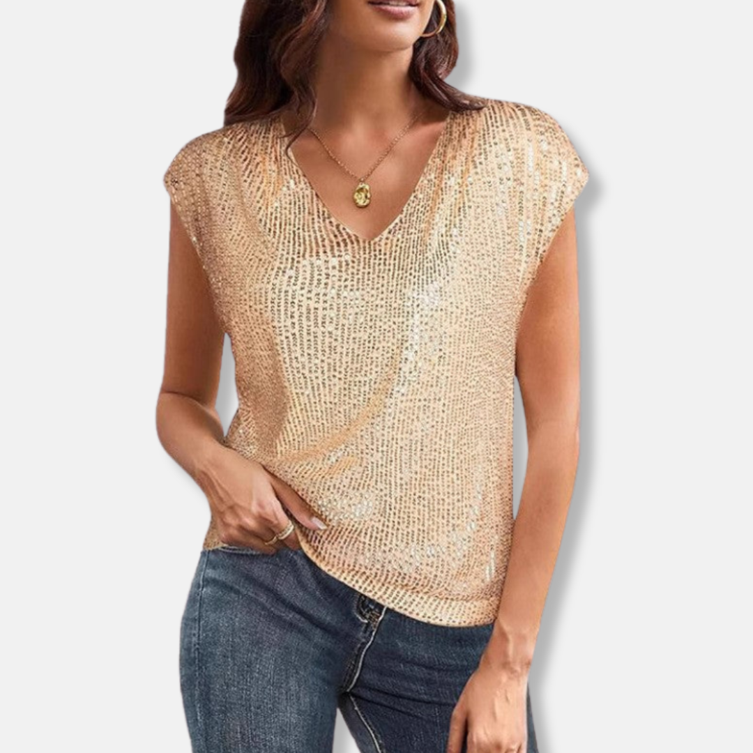 Woman wearing gold sparkly sequin V-neck top for evening wear