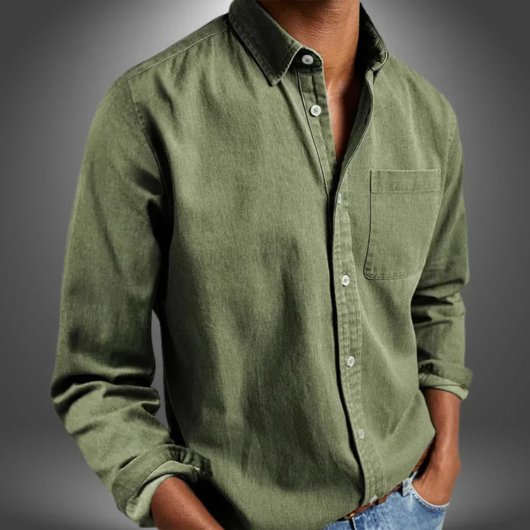 Man wearing green button-up shirt with front pocket
