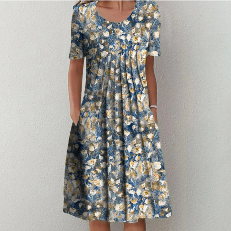 Elegant womens floral dress with a midi hemline and breathable short sleeve design.