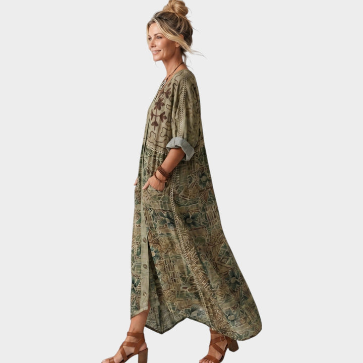 Side view of a woman wearing a green boho button-front midi dress
