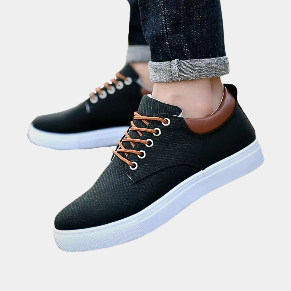 Pair of mens orthopaedic support casual shoes displayed on white background