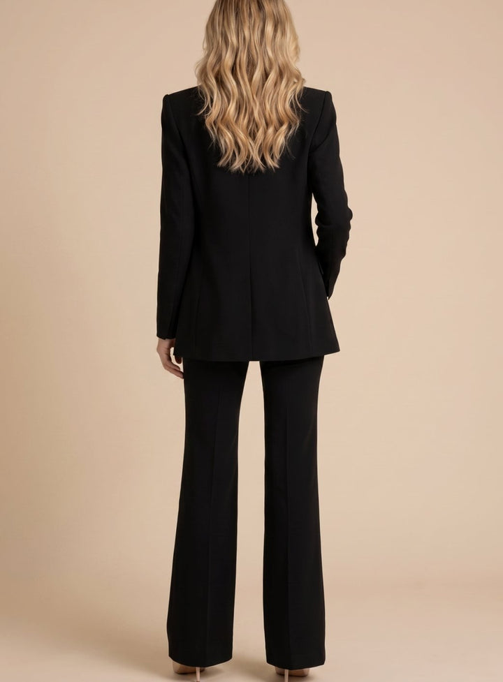 High-waisted elegant flared trousers paired with the formal blazer