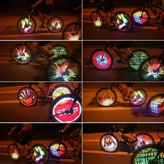 Waterproof 3D bicycle spoke LED lights illuminating a bike wheel for night cycling safety.