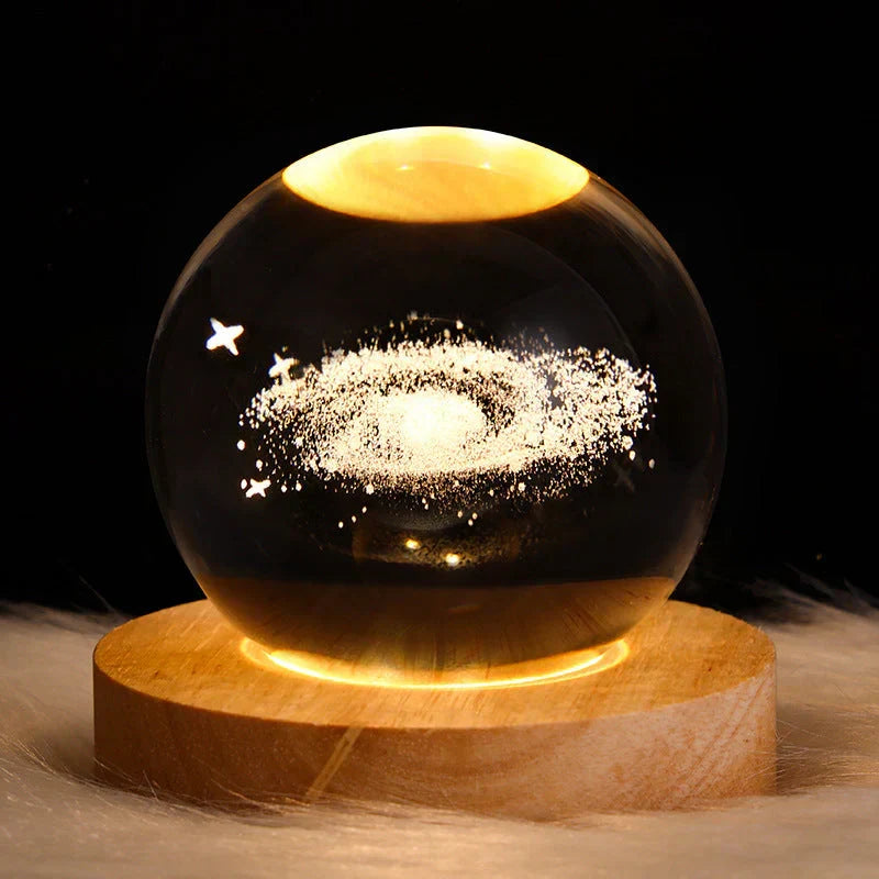 3D crystal night light glowing with wooden base on bedroom nightstand