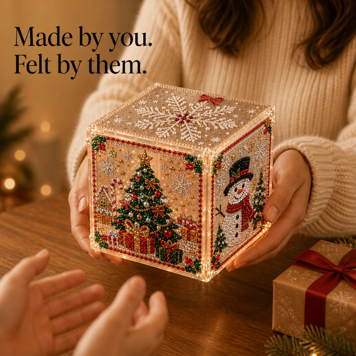 Wrapped Christmas gift box displaying vibrant diamond painting craft details