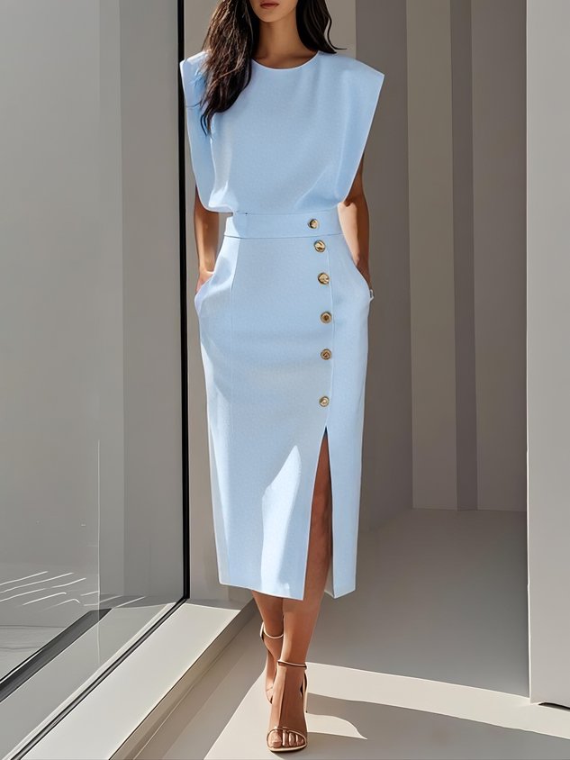 Detailed shot of the side slit detail on an elegant midi dress designed for stylish evening wear