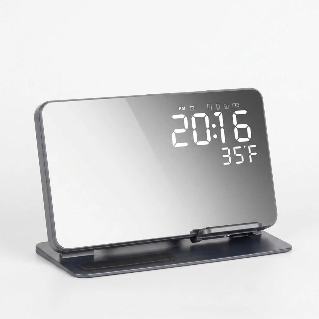 Front view of digital alarm clock display on wireless charging stand