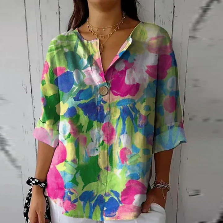 Relaxed fit floral v-neck shirt shown from the back view