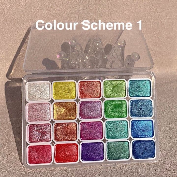 Detailed view of multicolour watercolour paint set pan arrangement art supplies
