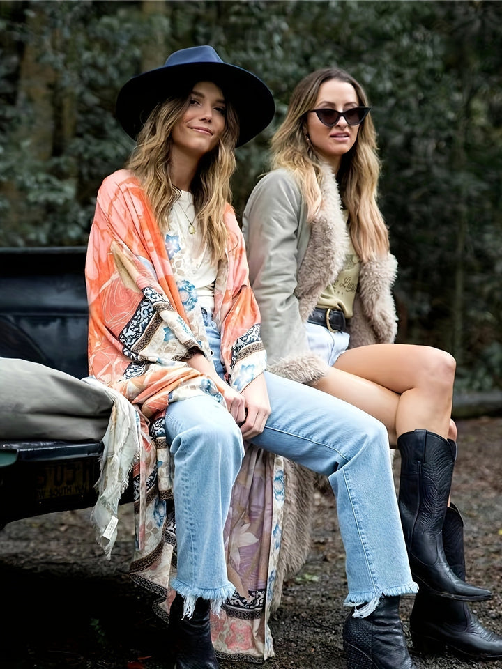 Two women styling casual outfits with bohemian kimono layers outdoors