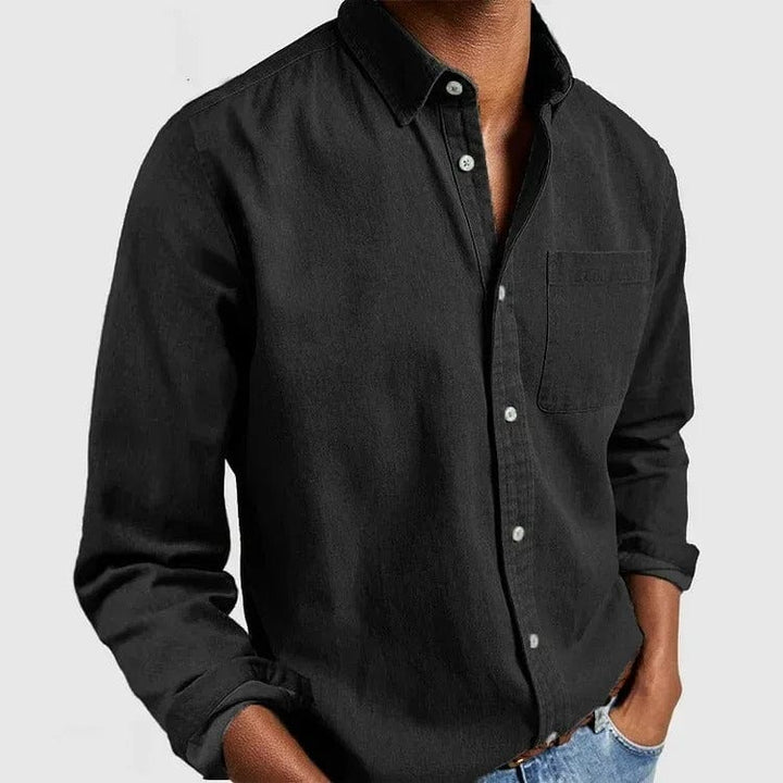 Close-up of chest pocket and label detail on menswear shirt