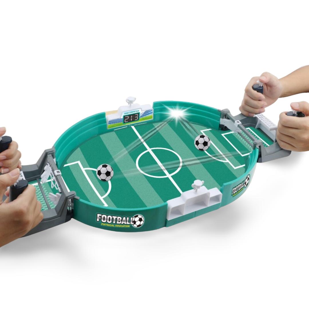 Two players competing in a fast-paced tabletop foosball match