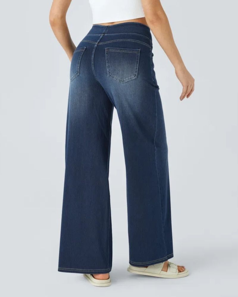 Side profile of women's high-waist wide-leg jeans showing loose fit