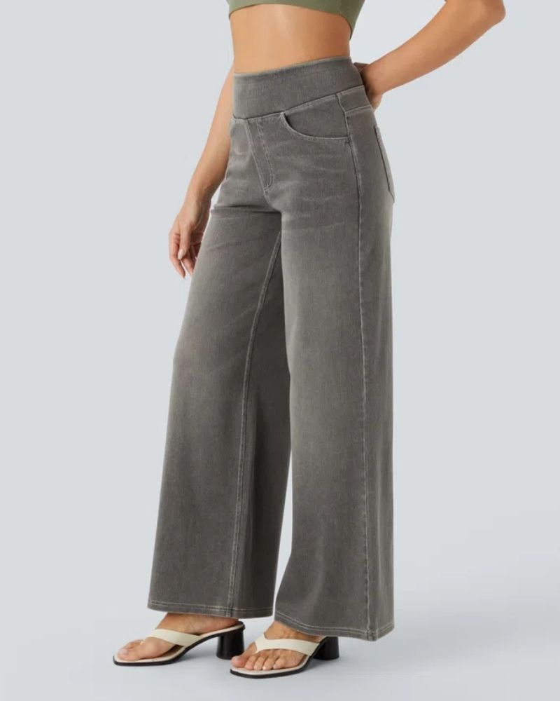 Soft stretch denim material close-up on high-waisted casual trousers