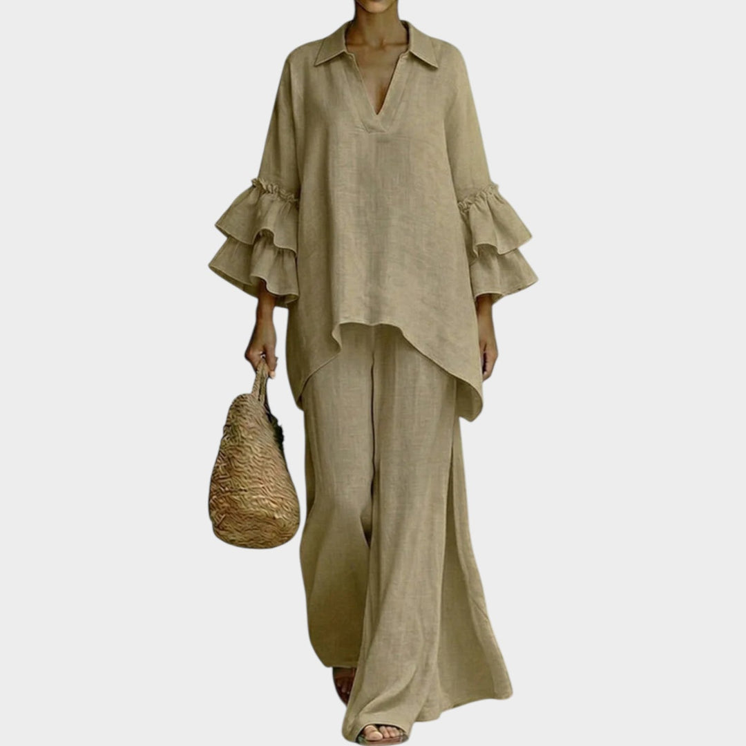 Model wearing khaki ruffle sleeve two piece matching set with wide-leg pants