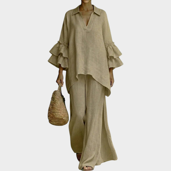 Model wearing khaki ruffle sleeve two piece matching set with wide-leg pants