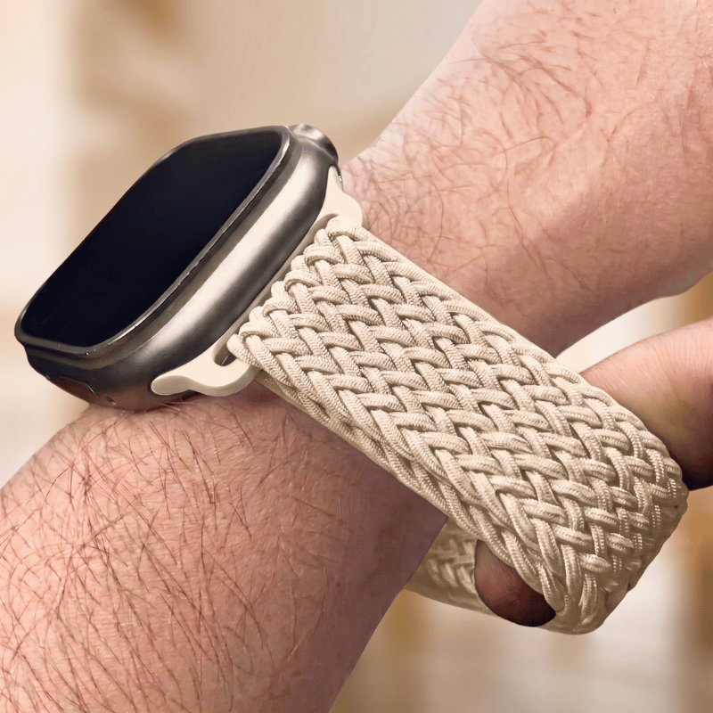 Flexible woven smartwatch replacement band resting flat