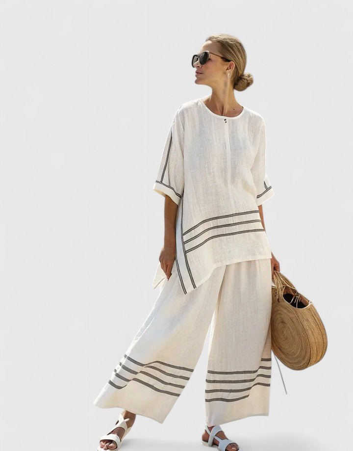 Dynamic shot of the two-piece set worn outdoors, emphasizing movement and wide-leg trousers.