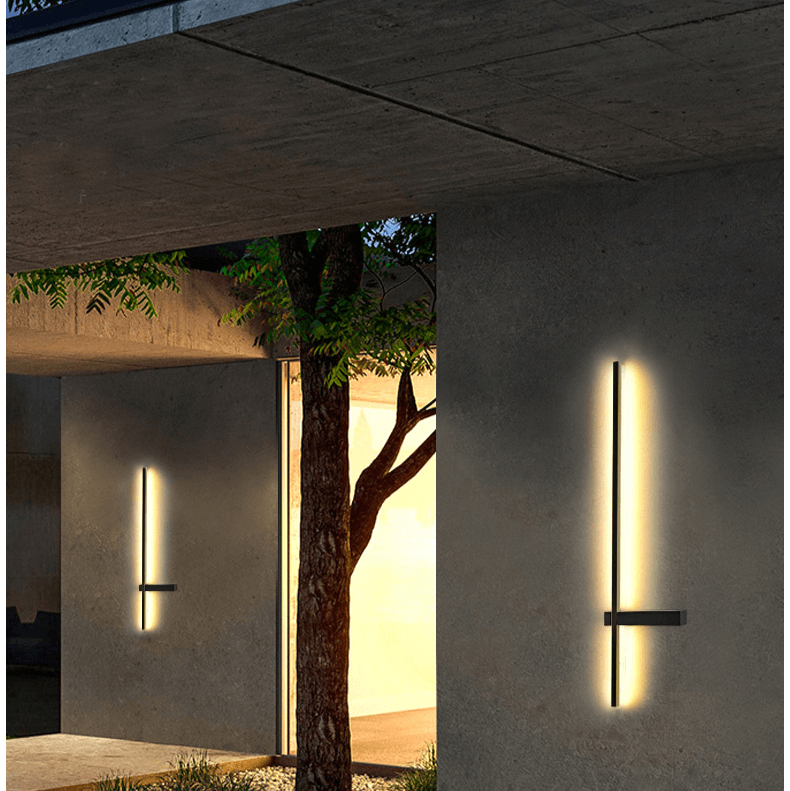 Side profile of the sleek exterior light mounted on a modern wooden patio wall