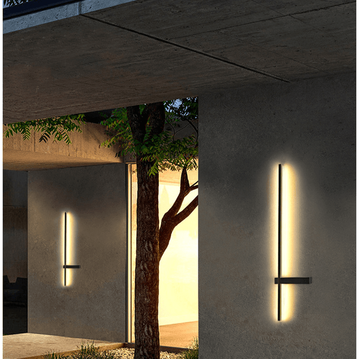 Side profile of the sleek exterior light mounted on a modern wooden patio wall