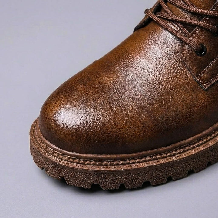 Cognac brown leather vintage boots lifestyle shot showing ankle height and casual outdoor style.