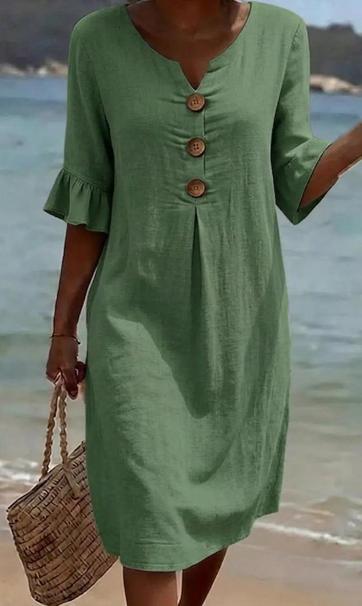 Detail shot of flutter sleeve on stylish summer beach dress
