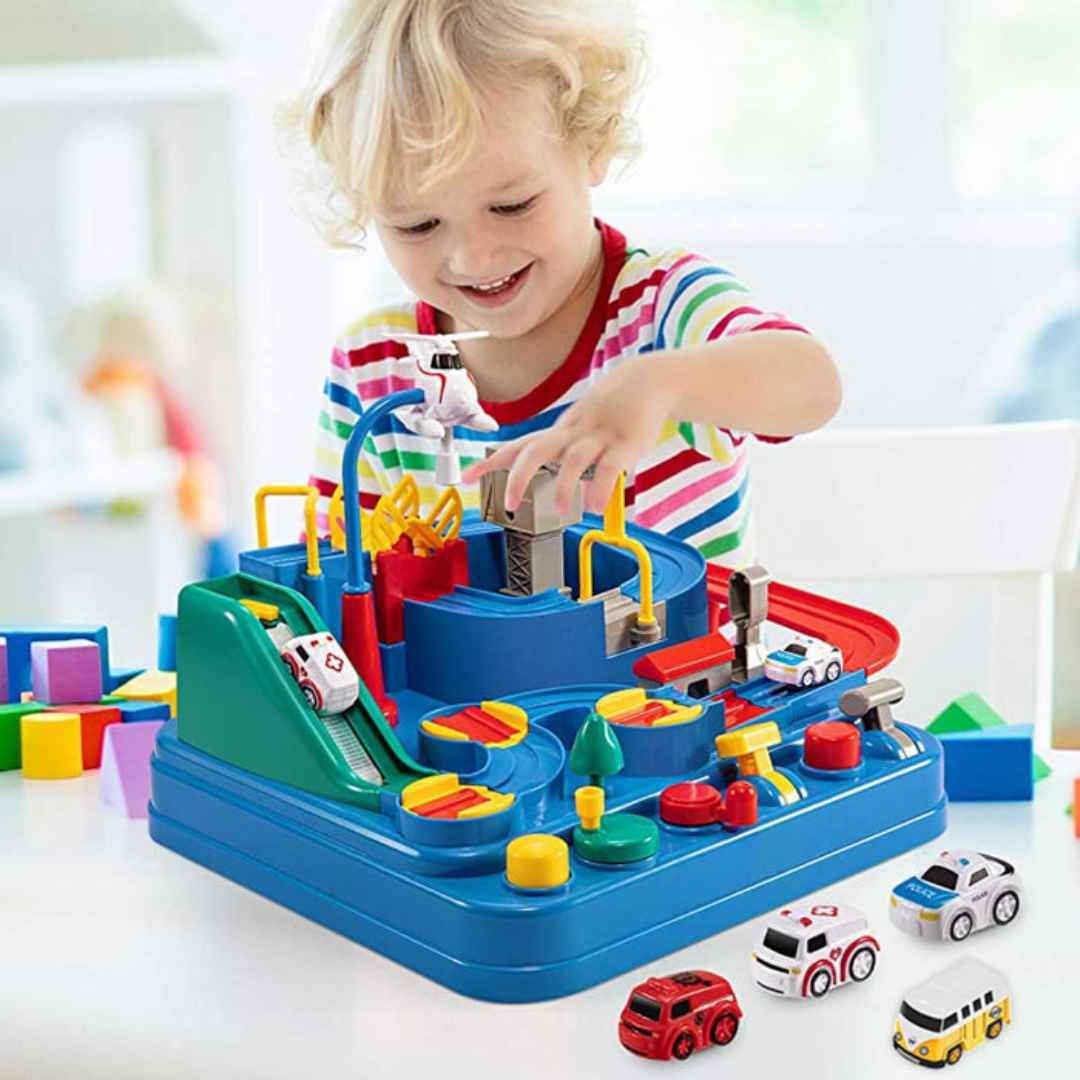 Toddler happily playing with the rescue adventure track toy