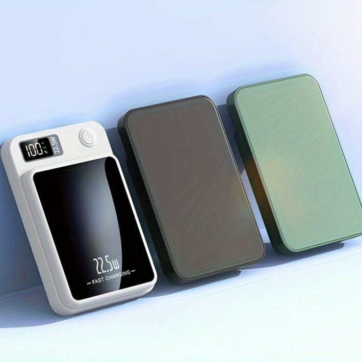 Slim magnetic power bank being held in hand to demonstrate pocket size