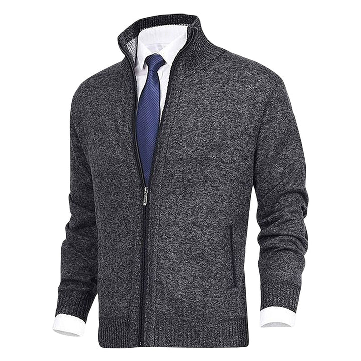 Men's comfortable zip sweater laid flat to show modern fit and design