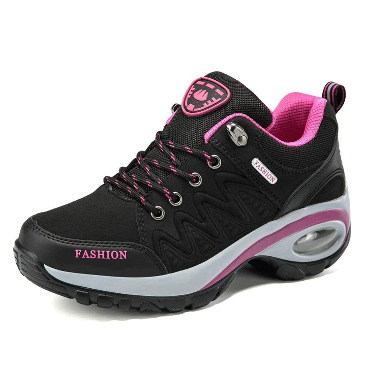 Black women's ergonomic walking sneaker with pink accents