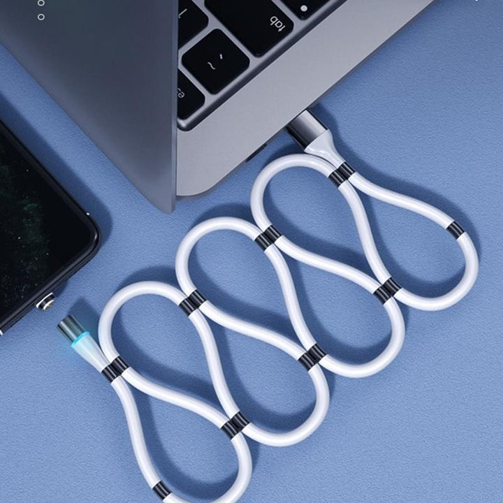 Tech gadget magnetic charging cable connected to a mobile phone