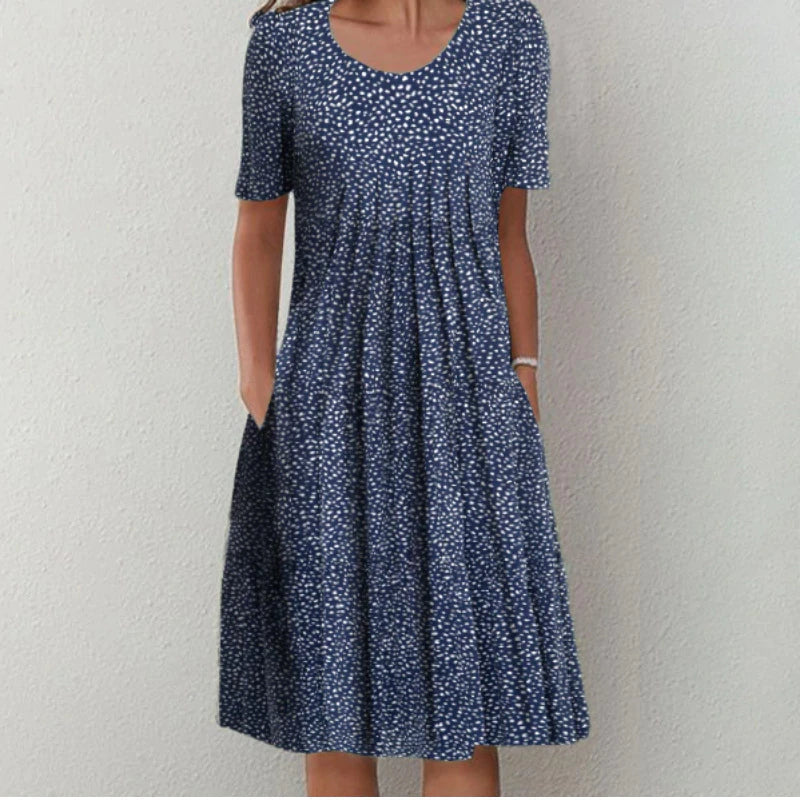 Chic womens floral print midi dress complete with comfortable short sleeves.
