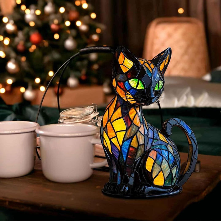 Stained glass mosaic cat lamp displayed in a cozy room setting
