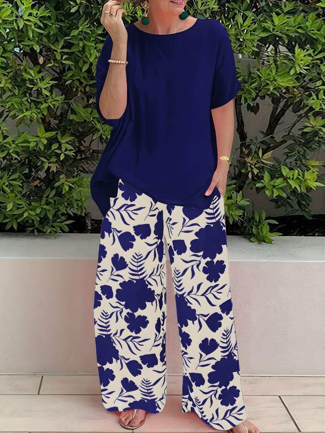 Full view of women's relaxed two-piece loungewear set with wide leg trousers in casual style