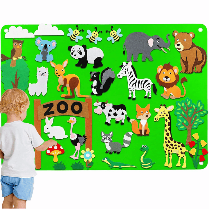 Happy child playing with educational felt story board as a learning gift