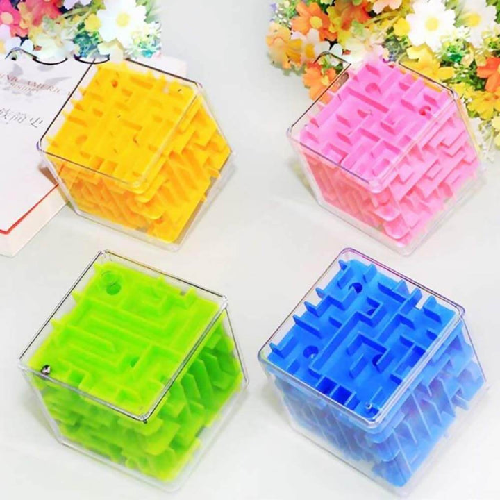 Four vibrant 3D labyrinth cube toys in yellow, pink, green, and blue