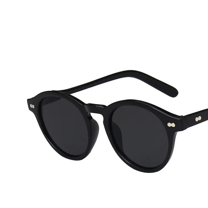 Stylish vintage round sunglasses showing frame detail and tint