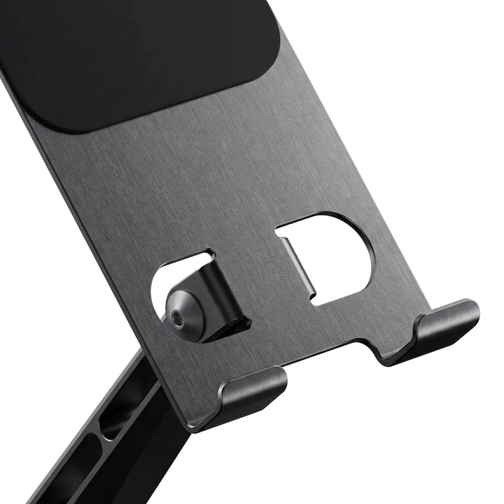 Compact foldable travel wireless charger powering multiple devices simultaneously