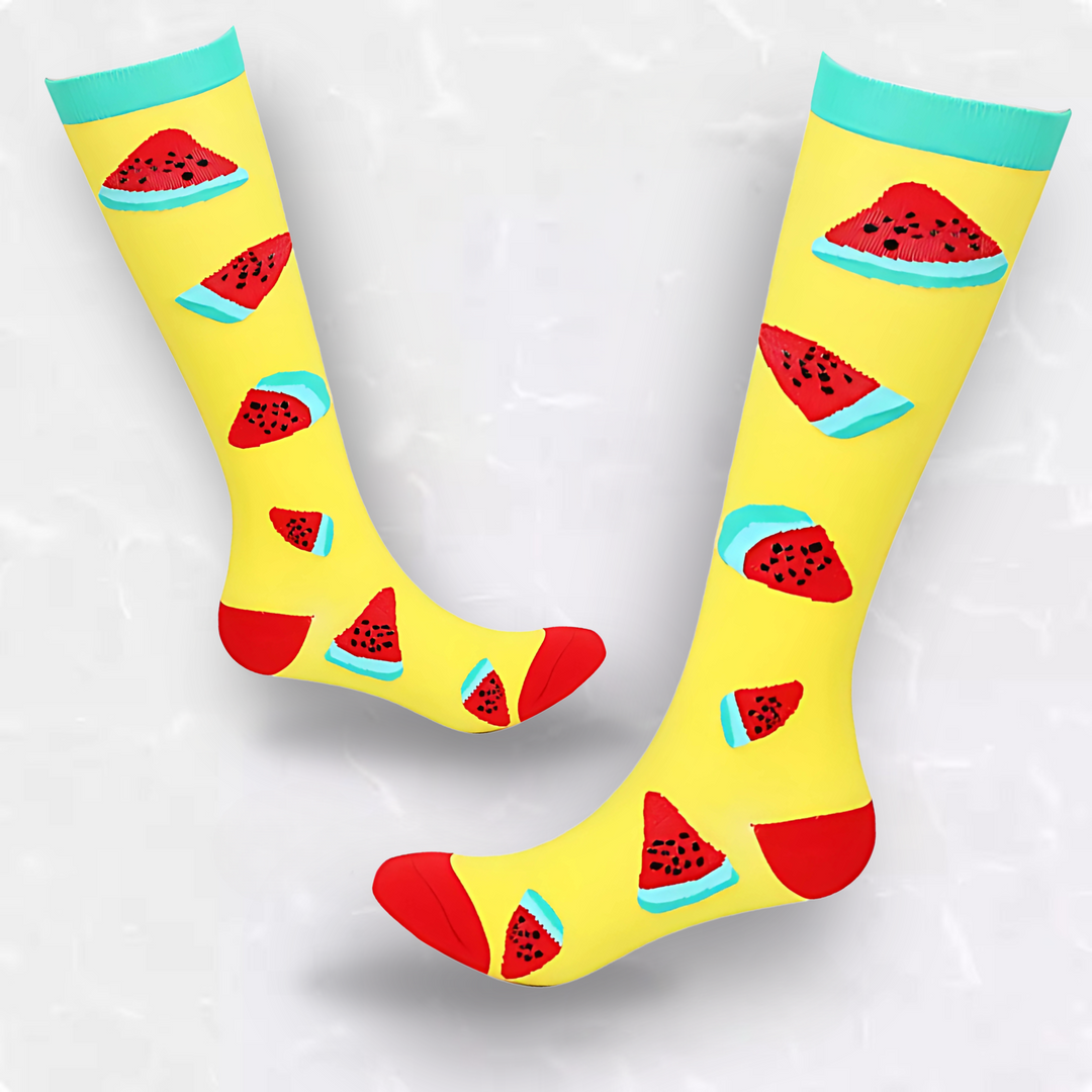 Unisex fruit patterned compression socks flat lay showing vibrant print