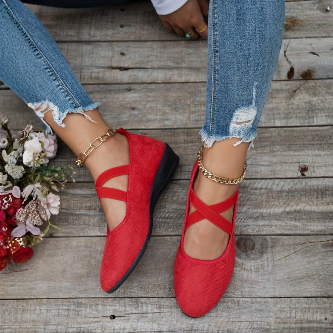 Red women's closed wedge ballet flats with decorative anklet