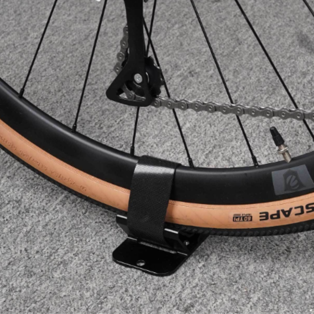 Universal fork mount bike carrier installed securely in a truck bed