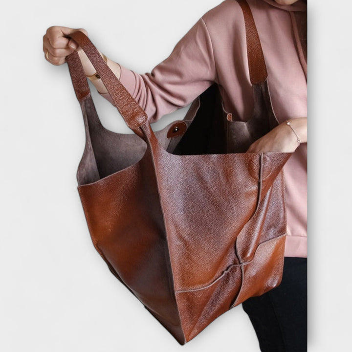 Travel bag view of the casual tote, highlighting its large capacity interior.