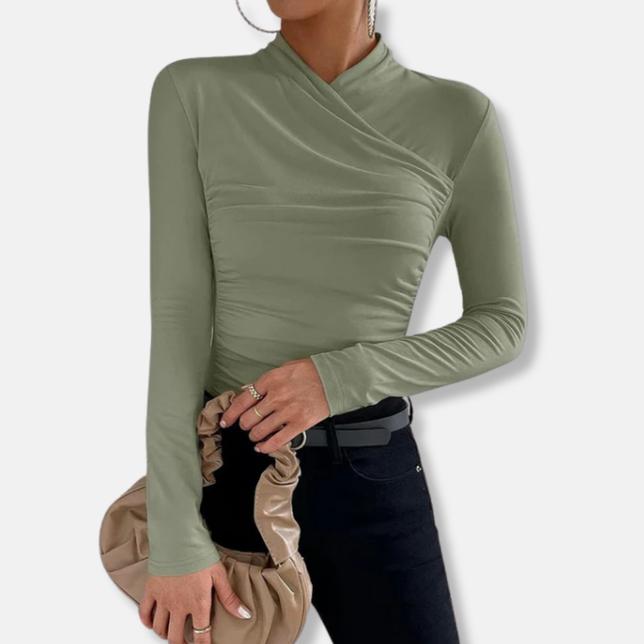 Side angle of women's long sleeve asymmetric ruched top with high neck