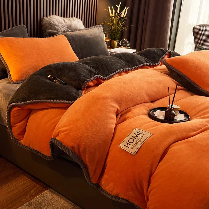 Plush fleece duvet set in soft neutral tone folded neatly for winter bedding